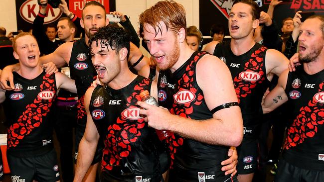 Aaron Francis celebrates his first AFL win.