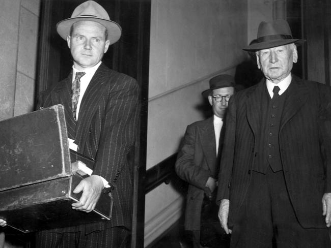 1950. John Wren, Melbourne financier, businessman, and colourful racing identity outside City Court.