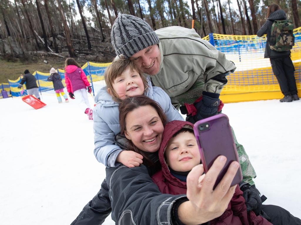 Wintry conditions hit Canberra on July 16, 2020. This visiting family from Sydney enjoyed the snow at Corin Forest. Picture: NCA NewsWire/Andrew Taylor