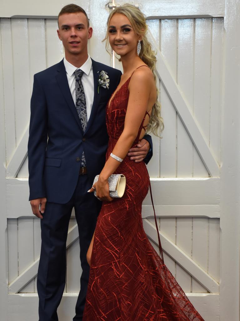 Hayden Nolan and Aliza Hoffman celebrate graduation at the Assumption College formal.