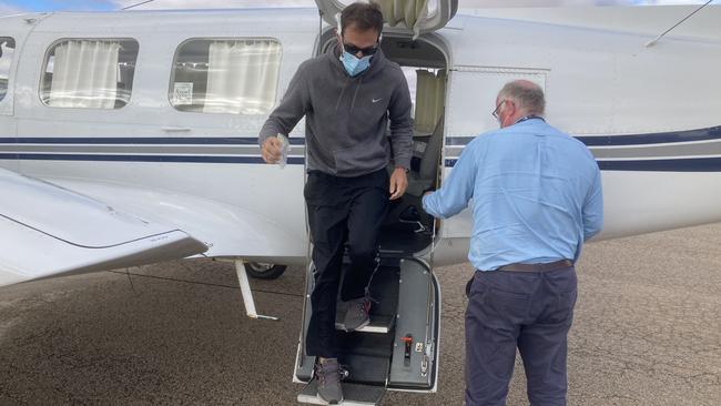 Pilot Paul Michel and Daniel Cioffi at the airport. Mr Cioffi was flown into Adelaide by Angel Flight.