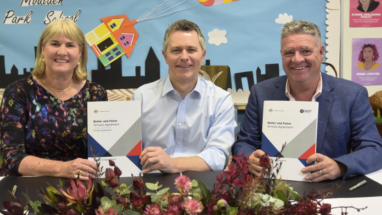 Chief Minister Eva Lawler, Federal Education Minister Jason Clare, and NT Education Minister Mark Monaghan sign the Better and fairer Schools Agreement for a billion-dollar funding commitment from the federal government. Picture: Sierra Haigh