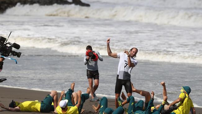 Owen Wright celebrates winning his men's bronze medal match against Gabriel Medina of Brazil. (Photo by Ryan Pierse/Getty Images)