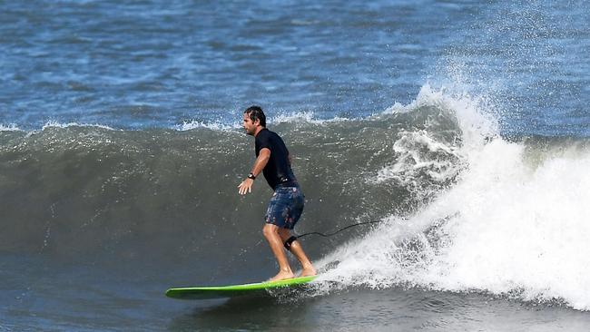 CYCLONE ALFRED: Surf conditions at Ann Street Break, Dicky Beach, 3.30pm. Pictured, Brad Holmes from Battery Hill. Photo: Patrick Woods.