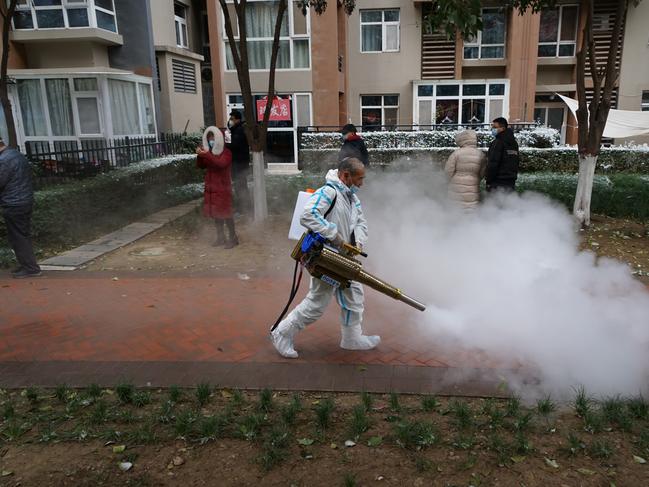 A worker disinfects a closed community in Xi ‘an, Shaanxi Province, China. Picture: Future Publishing via Getty Images