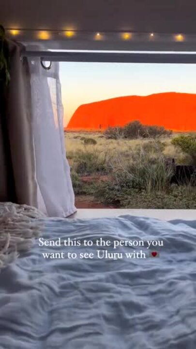 Uluru view from a van