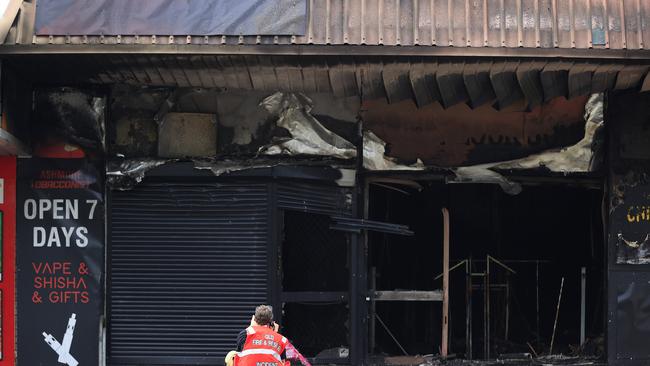 Emergency services on scene as shops are destroyed by an early morning fire at Ashmore Plaza. Pics Adam Head