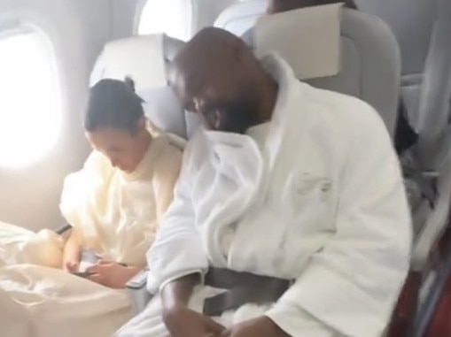 Kanye West and Bianca Censori were filmed onboard a flight in economy.