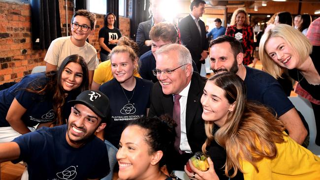 Prime Minister Scott Morrison and Queensland Senator Amanda Stoker (far right) pose for a group selfie during a Women Enterprising event at River City Labs in Brisbane. Picture: NCA NewsWire / Dan Peled