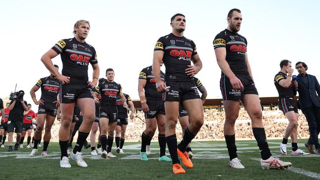 Nathan Cleary and Isaah Yeo of the Panthers come off the field at halftime during the qualifying final against the Warriors. (Photo by Matt King/Getty Images)