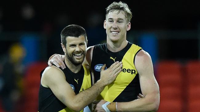 Trent Cotchin and Tom Lynch celebrate their win over the Western Bulldogs. Picture: Matt Roberts/AFL Photos/via Getty Images