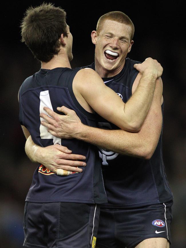 Sam Jacobs and Byrce Gibbs celebrate a goal for Carlton.