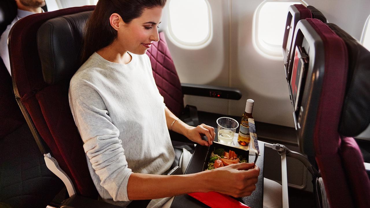 Dnata prepares the in-flight food for Qantas flights. Picture: Anson Smart, Brent Winstone