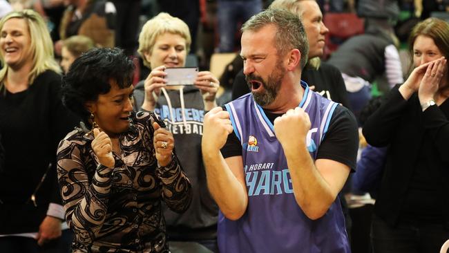 Hobart Chargers president David Bartlett celebrates the team’s SEABLE championship with Varuni Kulasekera. Picture: NIKKI DAVIS-JONES