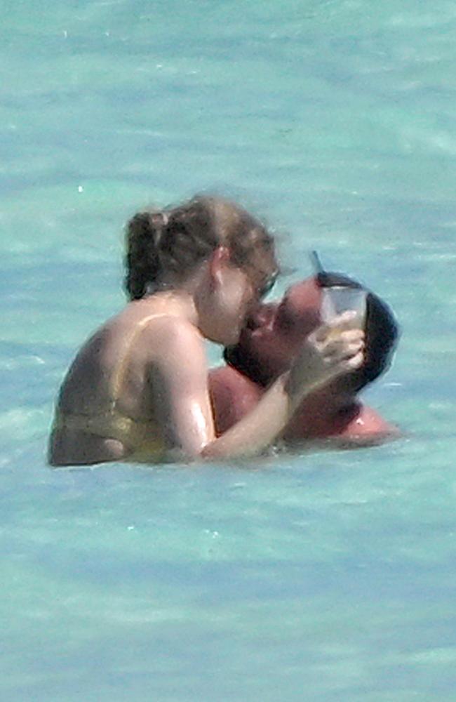 Taylor Swift and Travis Kelce were spotted being intimate on their first beach holiday together, in the Bahamas. Picture: Backgrid Australia