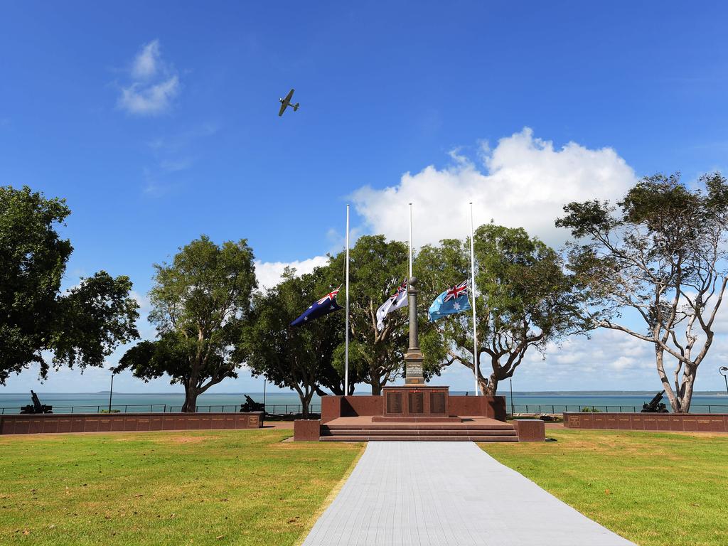 A plane is seen flying over the Cenotaph during the 77th Anniversary of the Bombing of Darwin on Tuesday, February 19, 2019. Picture: KERI MEGELUS