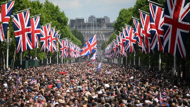 Members of the public fill The Mall before a fly-past during the Queen's Birthday Parade, the Trooping the Colour, as part of Queen Elizabeth II's Platinum Jubilee celebrations. Picture: Daniel Leal / AFP