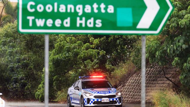 A Queensland Police car sits on the border of NSW and Queensland on the M1 yesterday. Photo: Scott Powick Newscorp Australia