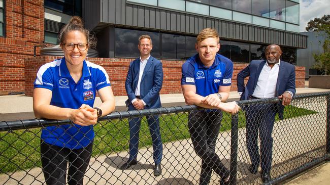 AFLW player Emma Kearney, community engagement general manager Cam McLeod, captain Jack Ziebell and chief executive Ben Amarfio at North Melbourne’s Arden St facility. Picture: Mark Stewart