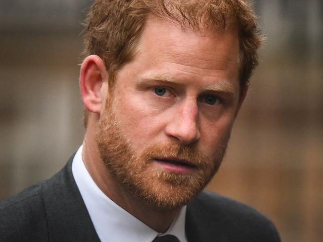 (FILES) Britain's Prince Harry, Duke of Sussex arrives at the Royal Courts of Justice, Britain's High Court, in central London on March 28, 2023. Lawyers for Prince Harry on December 5 began a legal challenge over his security arrangements in the UK, after he quit frontline royal duties and moved to North America.  The case about his loss of UK taxpayer-funded protection is the latest in a string of court proceedings initiated by Harry, whose father is King Charles III. (Photo by Daniel LEAL / AFP)
