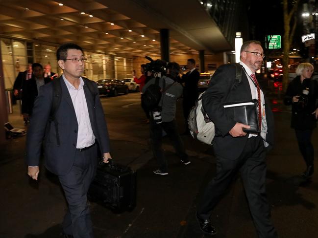 AFP officers leave the ABC headquarters in Ultimo. Picture: Damian Shaw