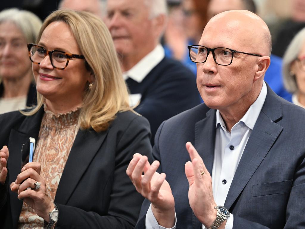 Peter Dutton (with wife Kirrily) was urged to “spend every cent” he had to save his seat of Dickson. Picture: Dan Peled/Getty Images