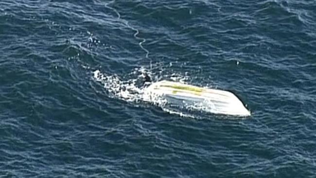 The alarm was raised about two hours later when their boat, a commercial fishing vessel, was found upturned off the coast about 4.15pm. Picture: 7NEWS