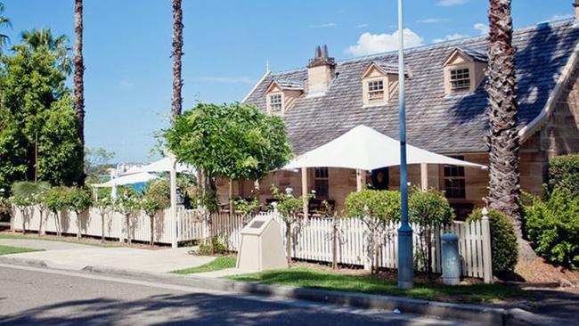 The historic cottage overlooks Looking Glass Bay on the Parramatta River.