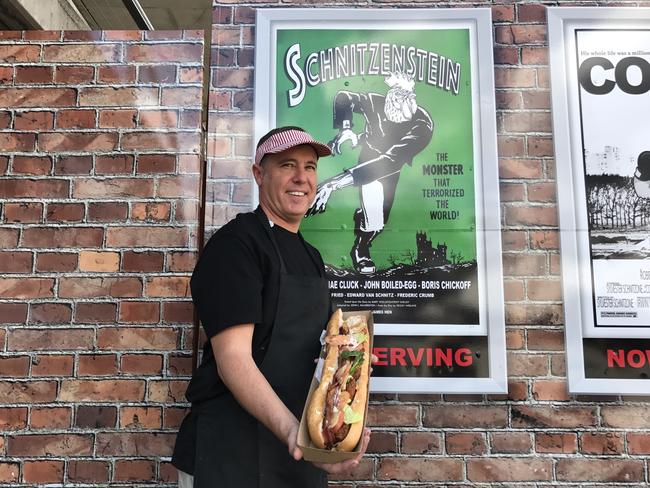 The Schnitzel Theatre’s co-owner Mick Smith shows off the Schnitzenstein. Picture: Jenifer Jagielski