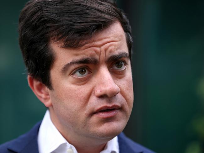 Sam Dastyari leaves home a day after resigning from the front bench. Picture: John Grainger