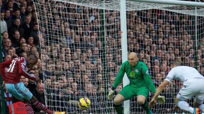 Brad Guzan thwarts West Ham United's Ecuadorian striker Enner Valencia.