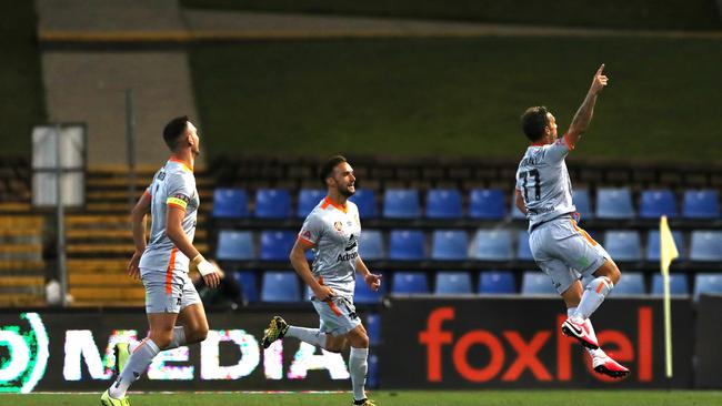 Roar attacker Scott McDonald celebrates his goal in his team’s 1-1 draw with the Phoenix. Picture: Tony Feder/Getty Images