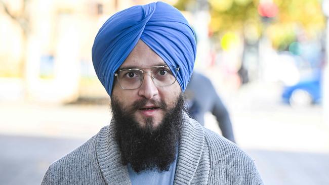 Jagmeet Singh leaves the Adelaide Magistrates Court where he is facing charges of killing a pedestrian while driving a semi-trailer. Picture: NCA NewsWire / Brenton Edwards