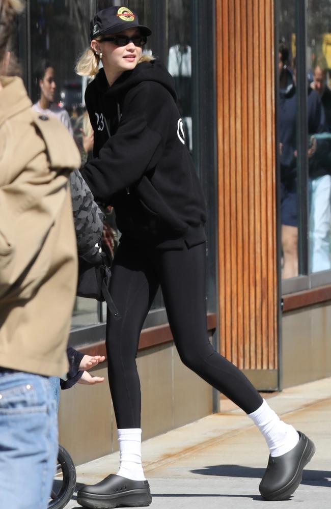 Turning Manhattan sidewalks into her personal runway, Gigi Hadid looked happy as she pushed her daughter Khai Malik, 3, in her stroller. No-one else could pull off this clogs and white crew socks combo. Could they? Picture: BACKGRID Australia