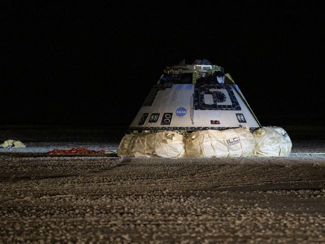 TOPSHOT - This NASA photo shows the Boeing CST-100 Starliner spacecraft after it landed in White Sands, New Mexico, on December 22, 2019. - The spacecraft landed after an abbreviated Orbital Flight Test for the company that still meets several mission objectives for NASA’s Commercial Crew program. The Starliner spacecraft launched on a United Launch Alliance Atlas V rocket at 6:36 a.m. December 20, 2019 from Space Launch Complex 41 at Cape Canaveral Air Force Station in Florida. (Photo by Bill INGALLS / NASA / AFP) / RESTRICTED TO EDITORIAL USE - MANDATORY CREDIT "AFP PHOTO /NASA/BILL INGALLS " - NO MARKETING - NO ADVERTISING CAMPAIGNS - DISTRIBUTED AS A SERVICE TO CLIENTS