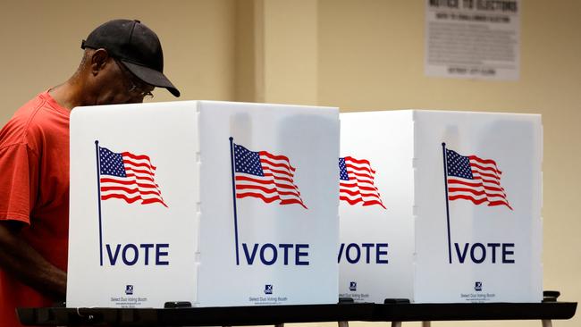 People cast their in-person early ballot in Detroit, Michigan. Picture: AFP.