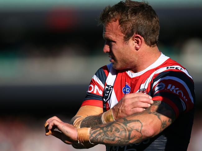 SYDNEY, AUSTRALIA - JULY 20: Jake Friend of the Roosters leaves the field injured during the round 18 NRL match between the Sydney Roosters and the Newcastle Knights at Sydney Cricket Ground on July 20, 2019 in Sydney, Australia. (Photo by Jason McCawley/Getty Images)