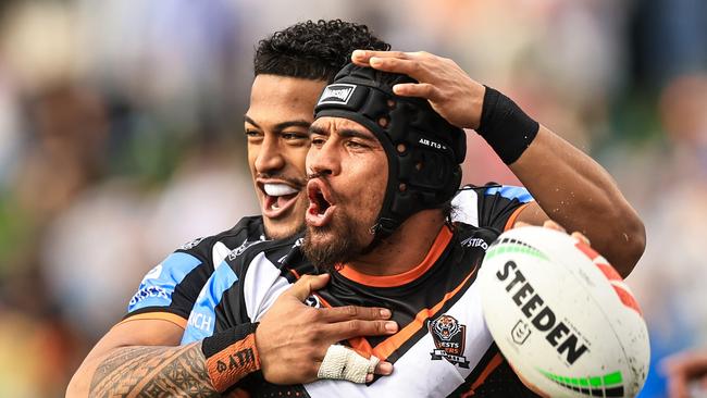 TAMWORTH, AUSTRALIA - MAY 11: Isaiah Papali'i of the Tigers celebrates a try with team mates during the round 10 NRL match between Wests Tigers and Newcastle Knights at Scully Park, on May 11, 2024, in Tamworth, Australia. (Photo by Mark Evans/Getty Images)