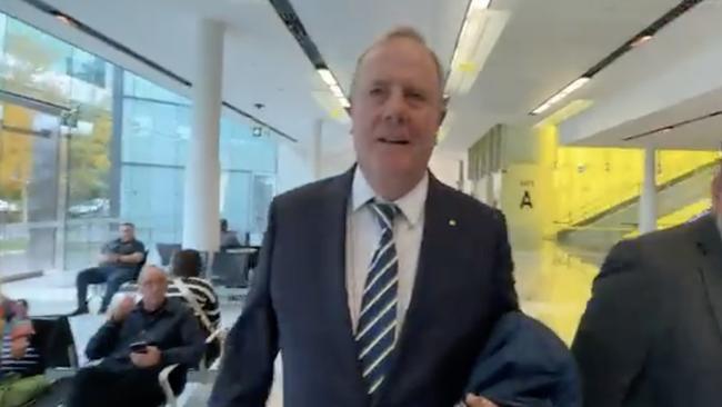 The footage appears to show Nine chair Peter Costello shoving a journalist to the ground. Picture: Supplied.