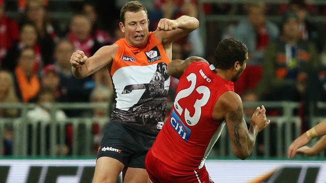 The moment Steve Johnson bumped Lance Franklin to the ground. Picture: Toby Zerna