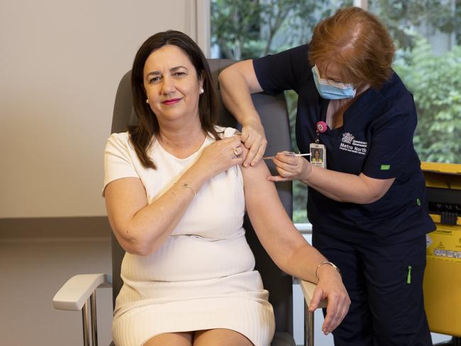 BRISBANE AUSTRALIA - NewsWire Photos JUNE 7, 2021: Queensland Premier Annastacia Palaszczuk is given the her COVID-19 vaccination by clinical nurse Dawn Pedder at the Surgical Treatment Rehabilitation Service Centre in Brisbane. NCA NewsWire / Sarah Marshall