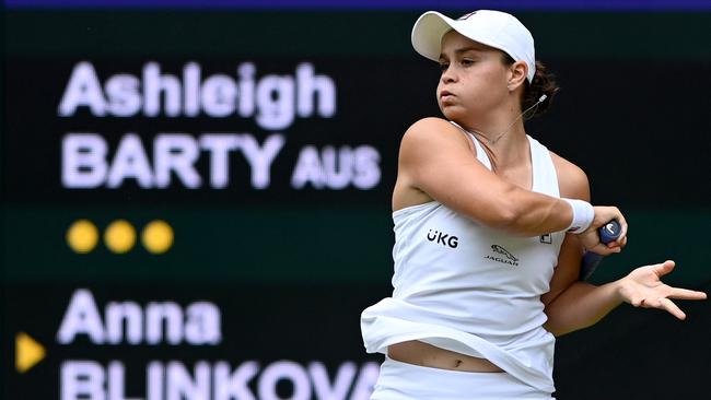 Ash Barty returns during her straight sets victory over Anna Blinkova. Picture: AFP