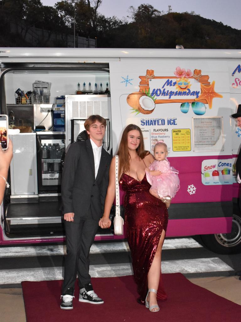Jade Anell, Kayla Glossop, and daughter Rileigh Glossop-Anell at the Proserpine State High School formal at Shute Harbour Marine Terminal on November 15, 2023. Photo: Zoe Devenport