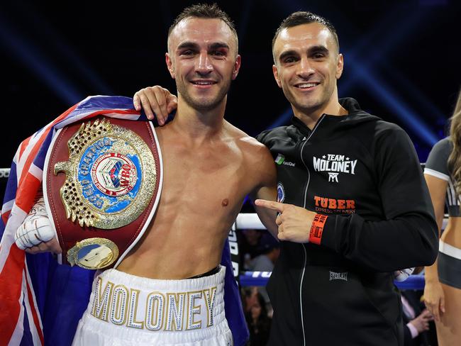 Jason and twin brother Andrew celebrate Jason’s world title win. Picture: Mikey Williams/Top Rank Inc via Getty Images