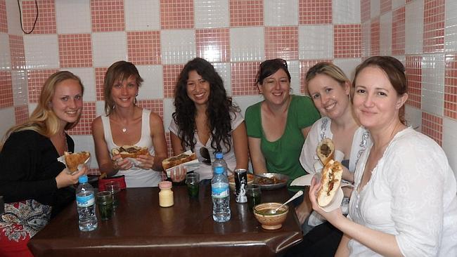 Trying camel burgers with my Intrepid group in Morocco. Picture: Tatyana Leonov