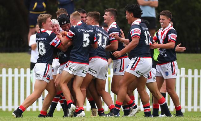 Roosters celebrate a try. Picture: Jeremy Ng