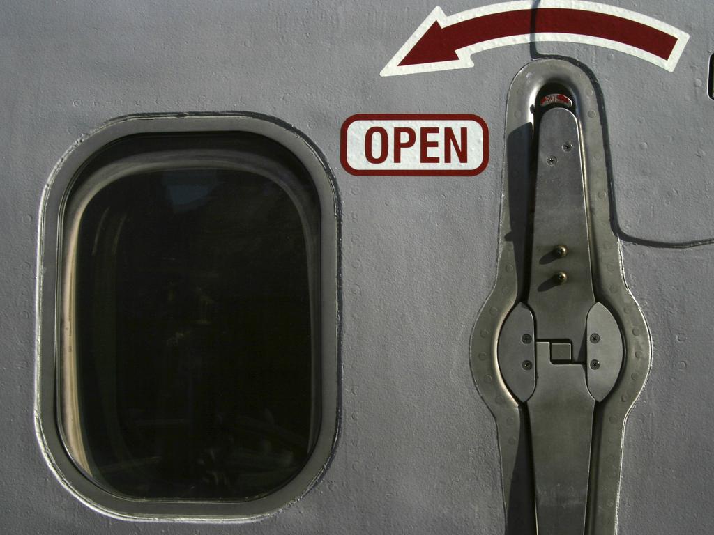 Plane doors are difficult to open mid-flight, making it unlikely.