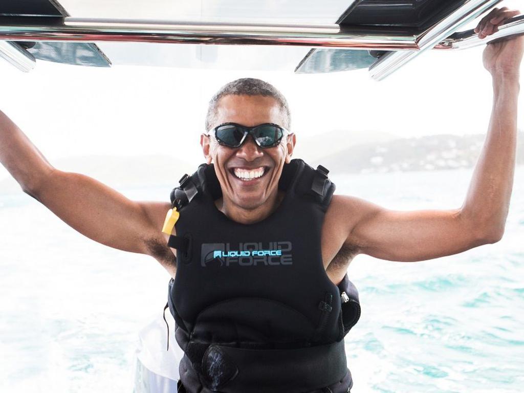 Former US president Barack Obama is pictured during a kitesurfing session. Picture: AFP