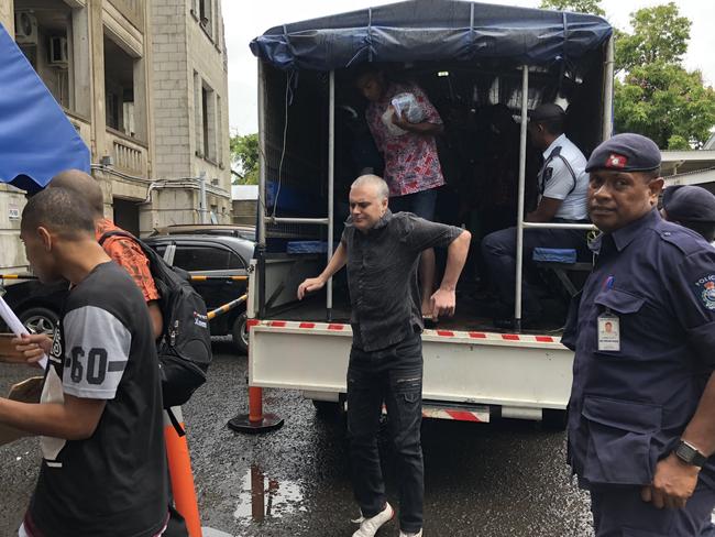 John and Yvette Nikolic arrived at Suva High Court by prison truck. Picture: Varanisese Bolatagane/News Corp Australia