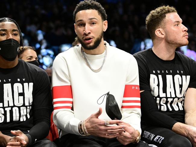 NEW YORK, NEW YORK - FEBRUARY 14:  Ben Simmons of the Brooklyn Nets looks on from the bench during the first half against the Sacramento Kings at Barclays Center on February 14, 2022 in New York City. NOTE TO USER: User expressly acknowledges and agrees that, by downloading and or using this photograph, User is consenting to the terms and conditions of the Getty Images License Agreement.  (Photo by Steven Ryan/Getty Images)